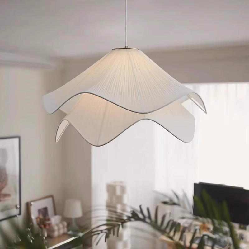 Single pleated floral pendant light in a living room