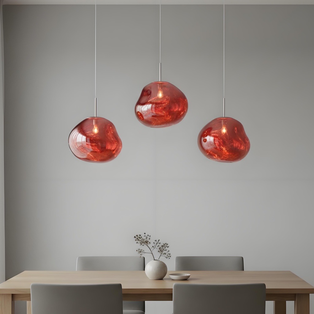 Red Glyador pendants above a table