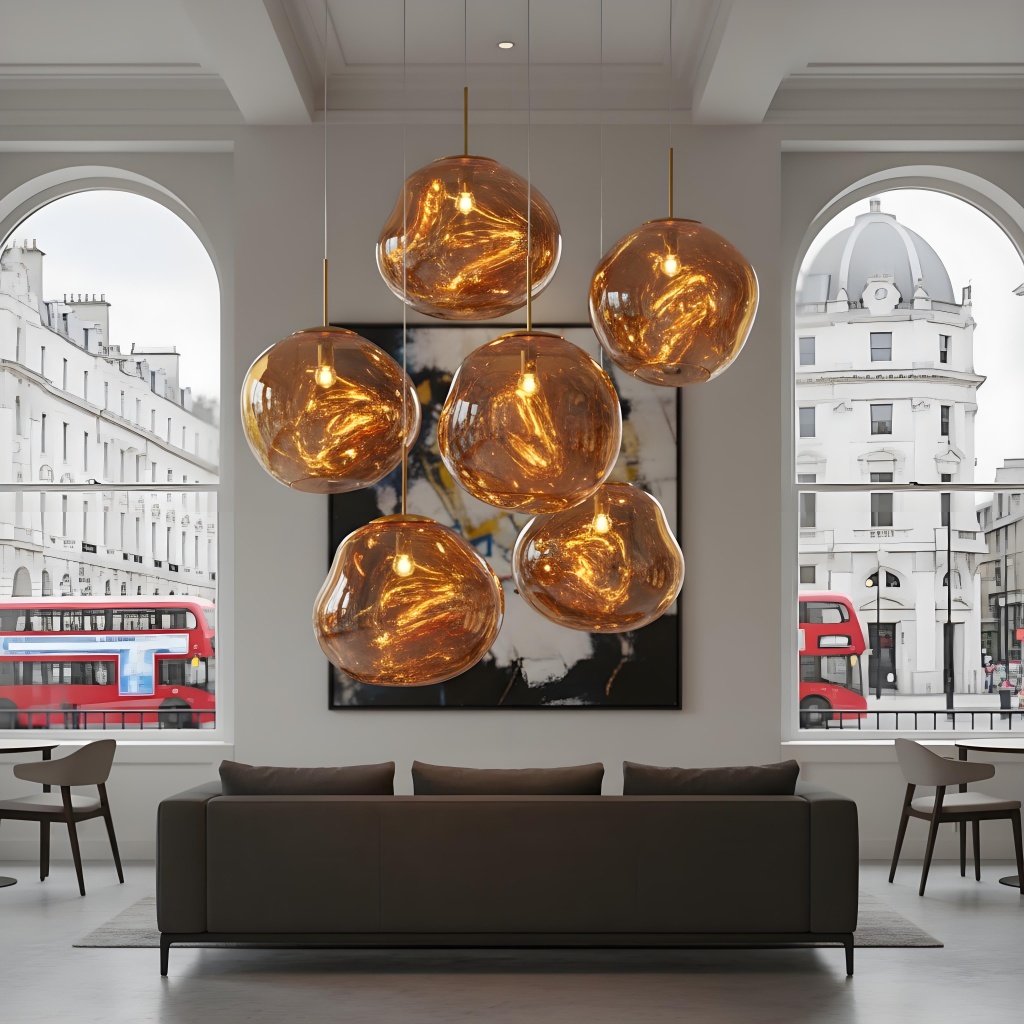 Clustered gold Glyador pendants near windows