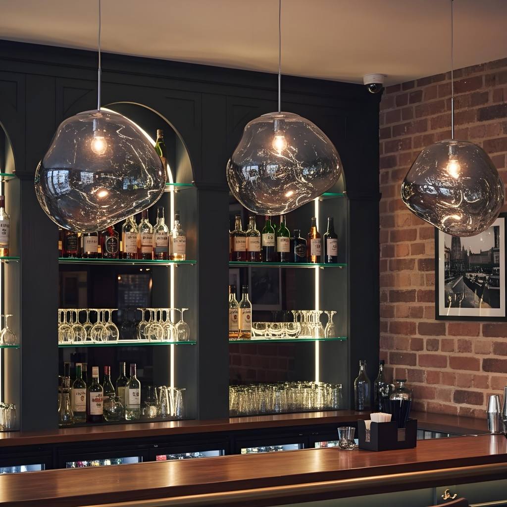 Smoke gray Glyador pendants in bar interior