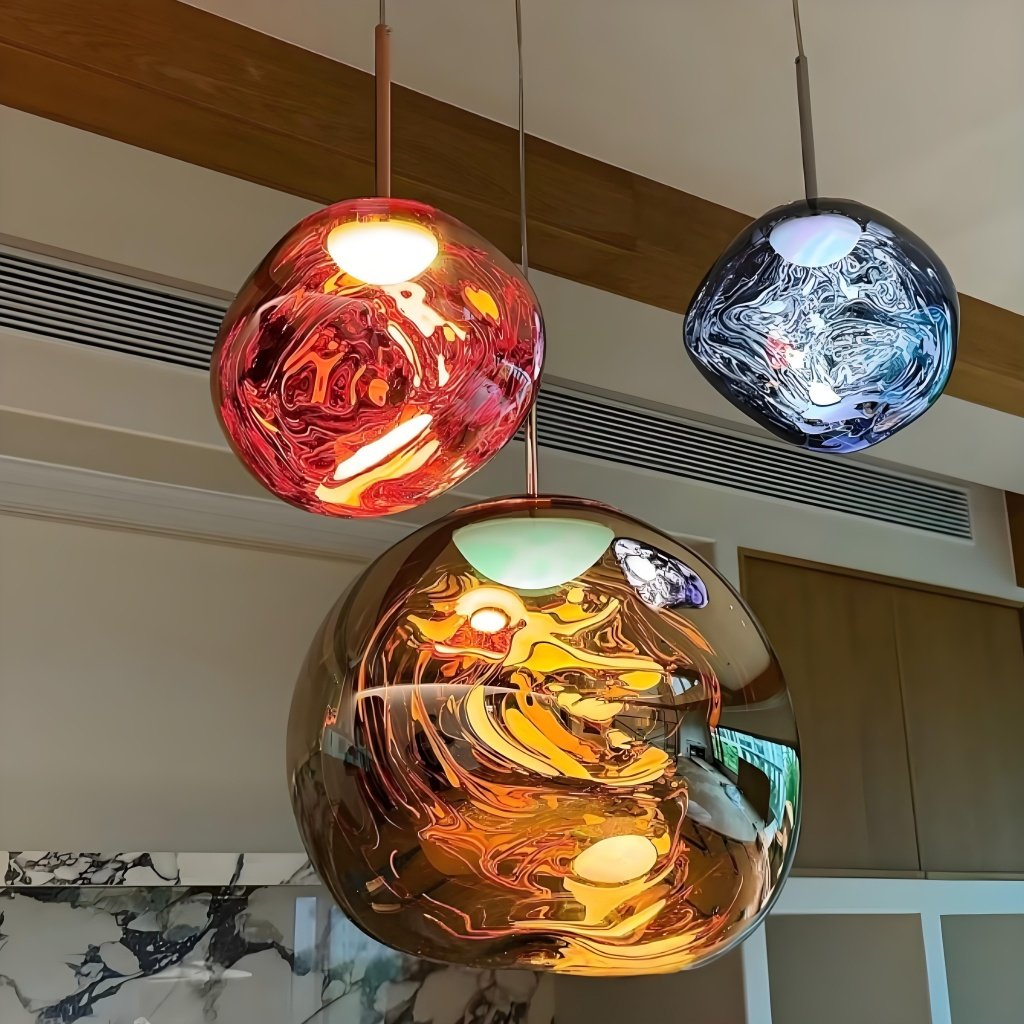 Red and gold Glyador pendants in a real room