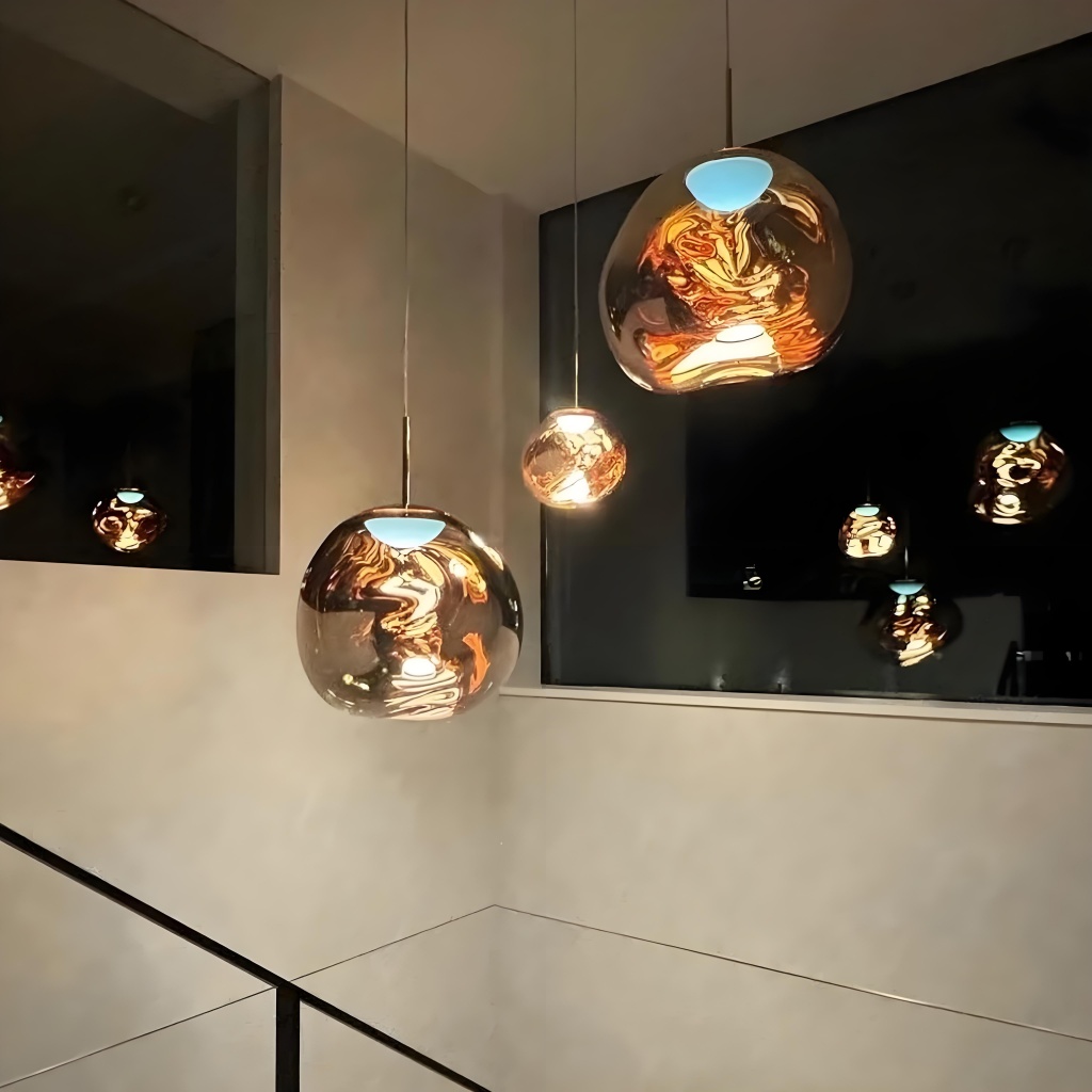 Gold Glyador pendants in staircase interior