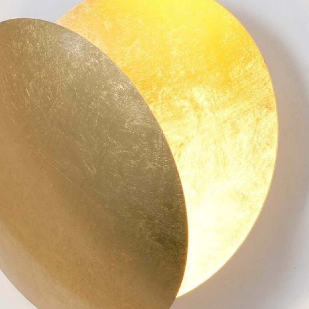 Close up of layered brass discs