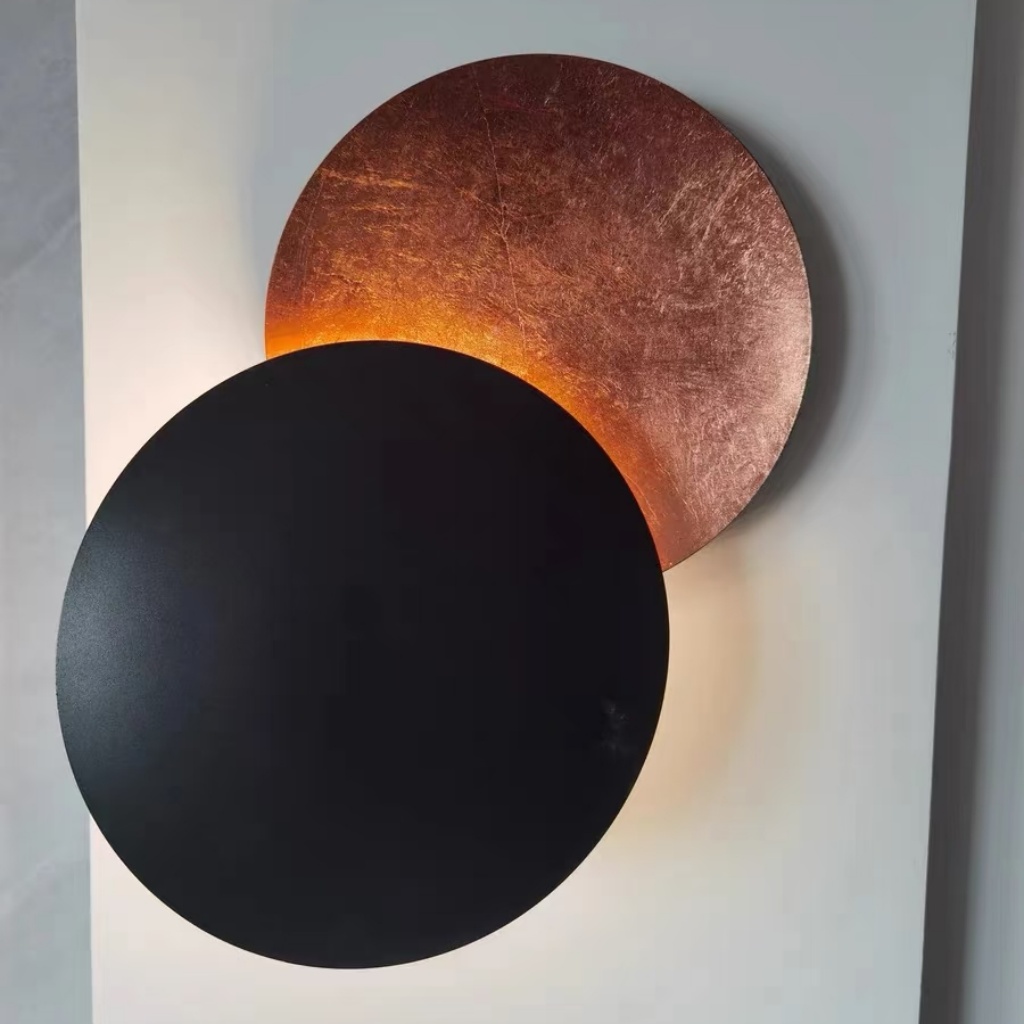 Black and copper Discola wall light close up