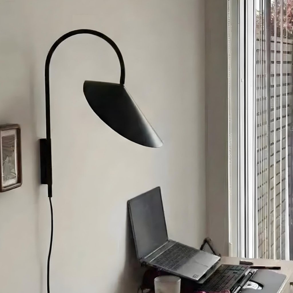 Swivora wall light in a real interior