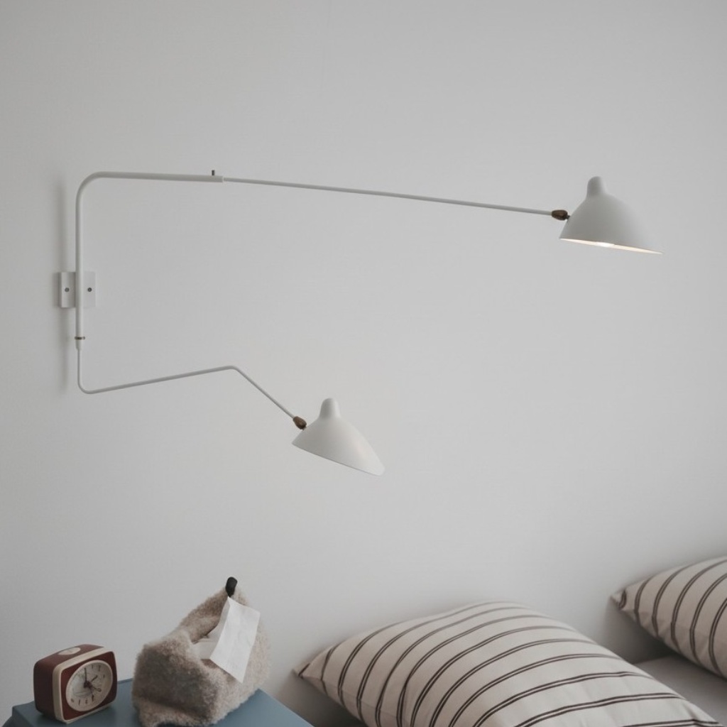White Arclume wall light in a bedroom