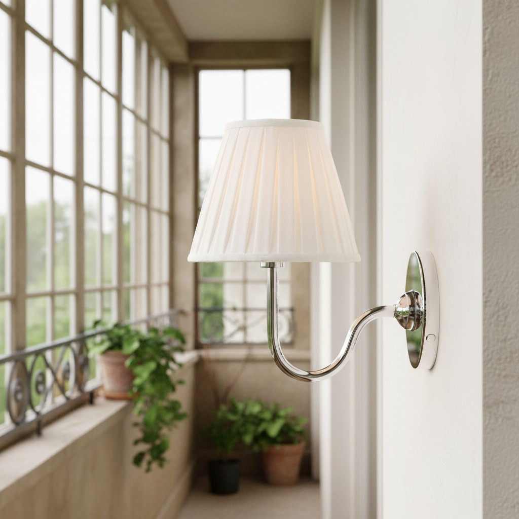 Chrome wall light by window