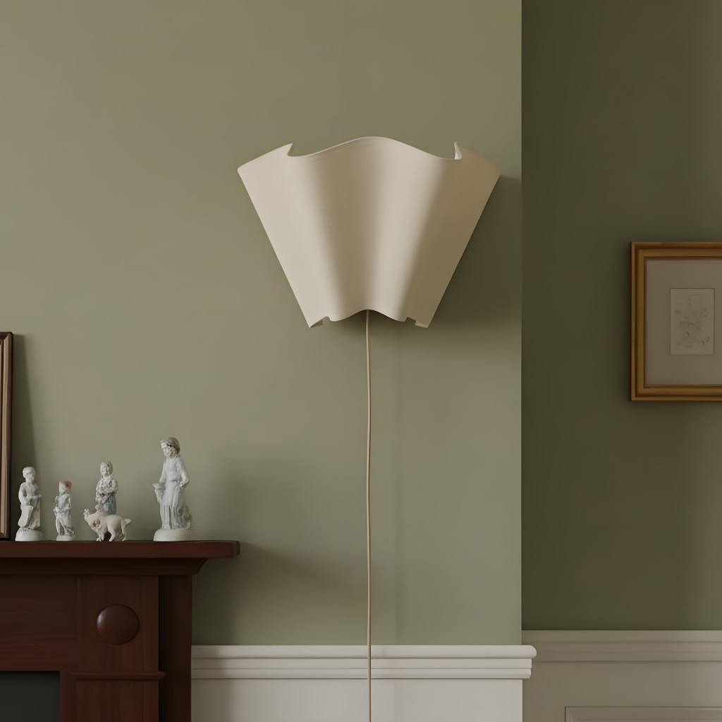 Oslan wall sconce accent lighting near framed artwork