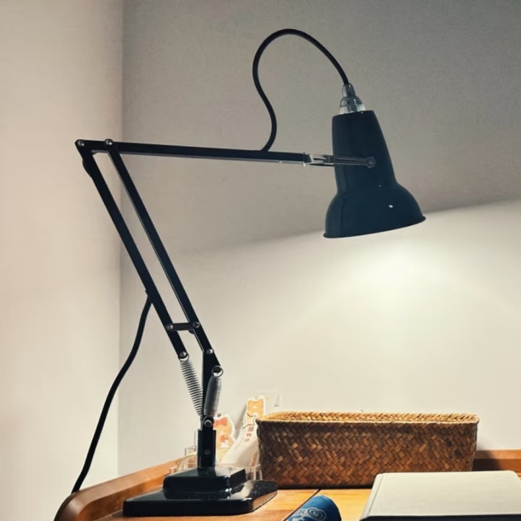 Black desk lamp in a real home space