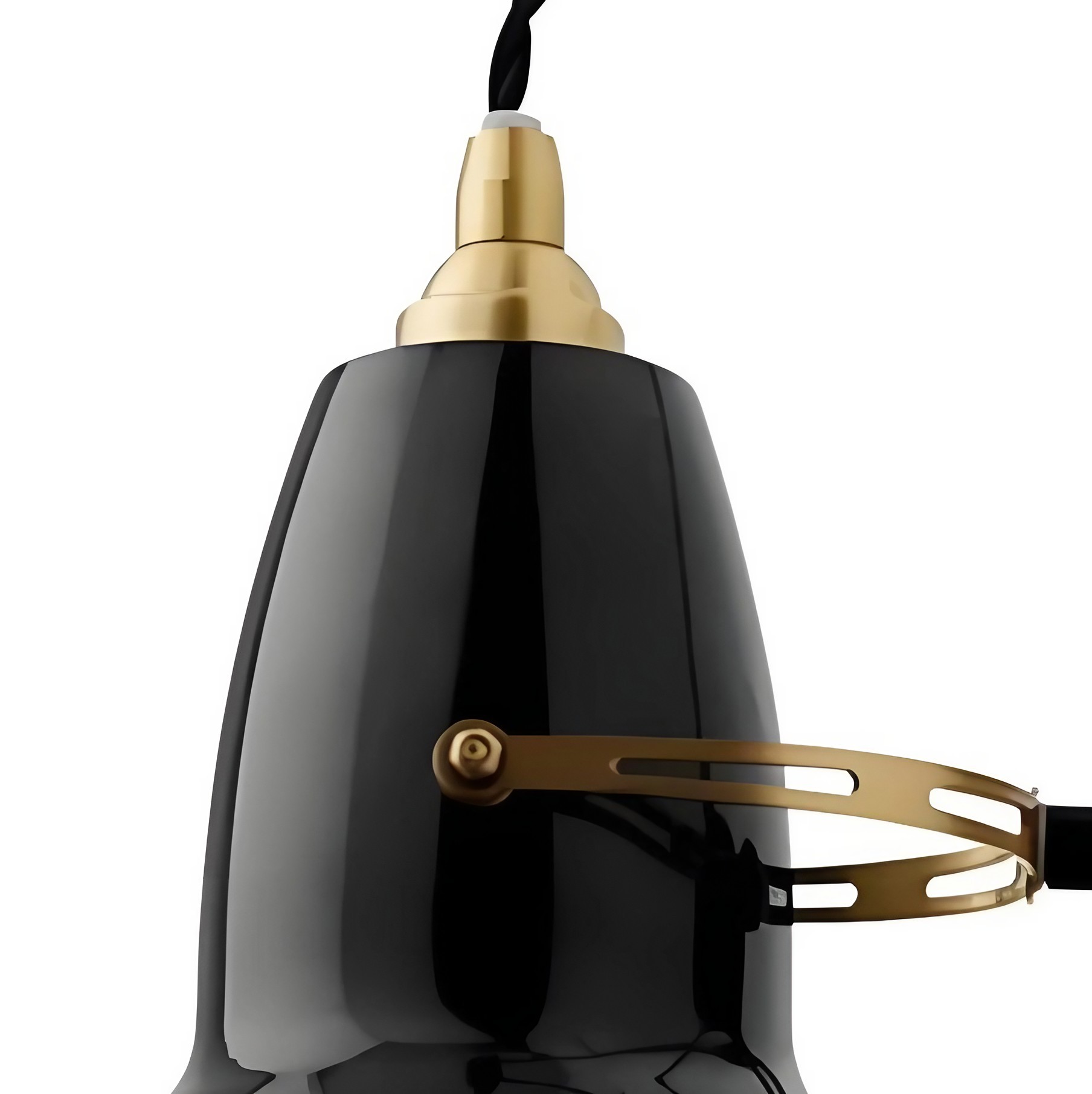 Close view of the black Modryx wall light shade and brass detail
