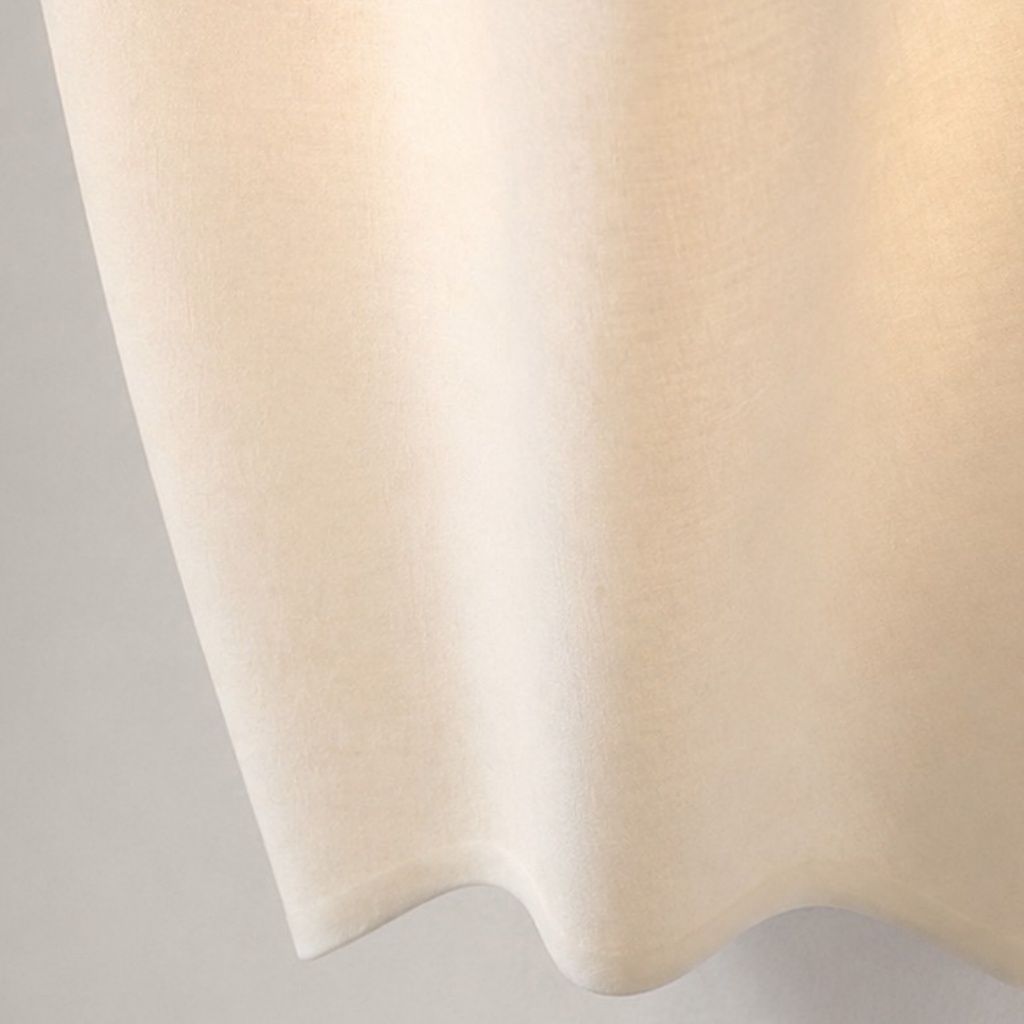 Close detail of the soft folded linen shade