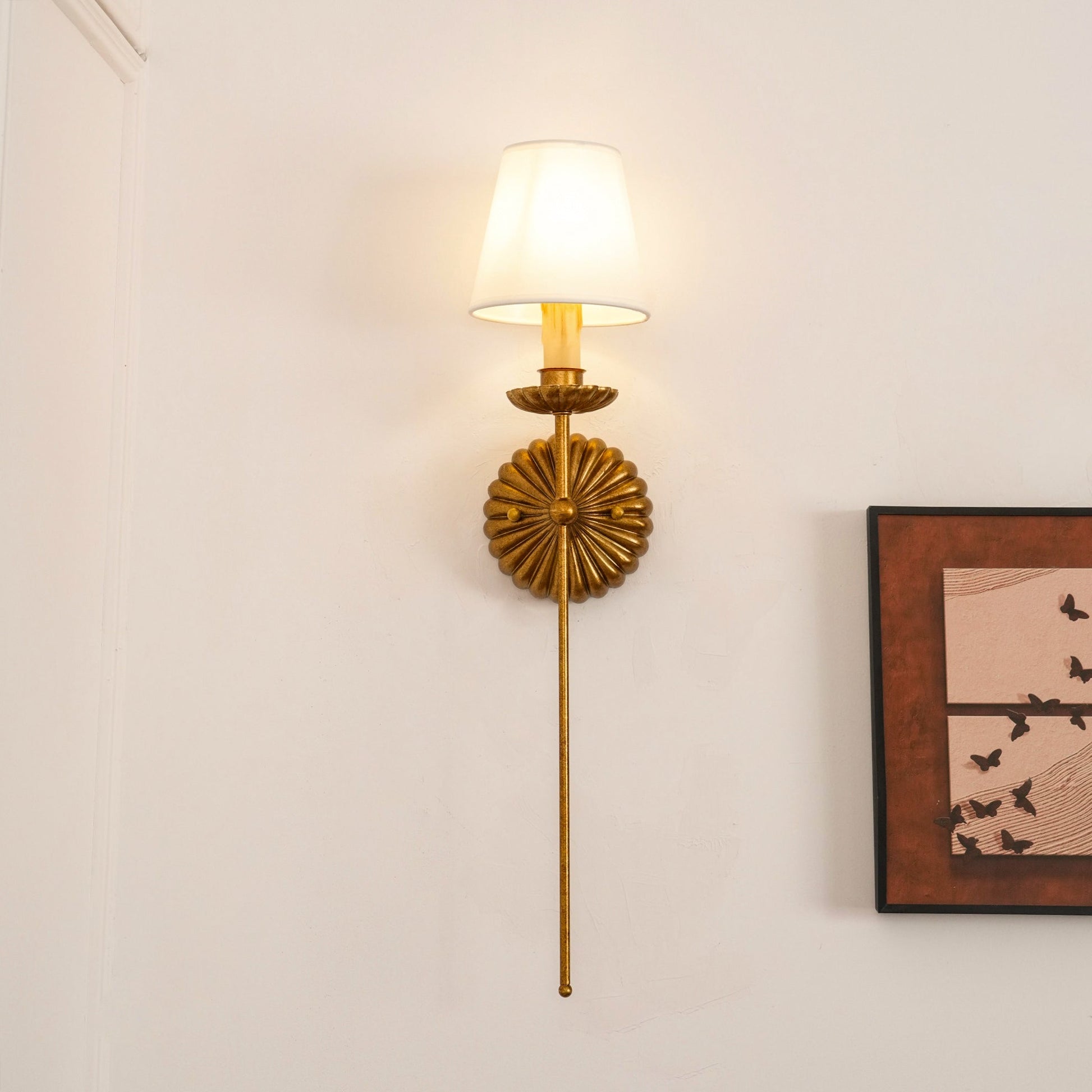 Catina wall sconce mounted on a wall