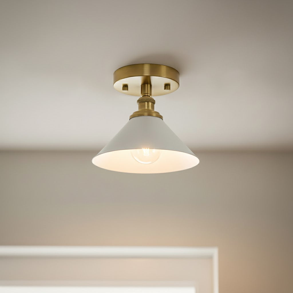 Close-up of Thetford ceiling light brass canopy and cone shade