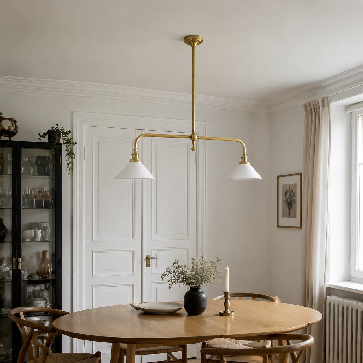 Thetford Pendant Light above a round dining table