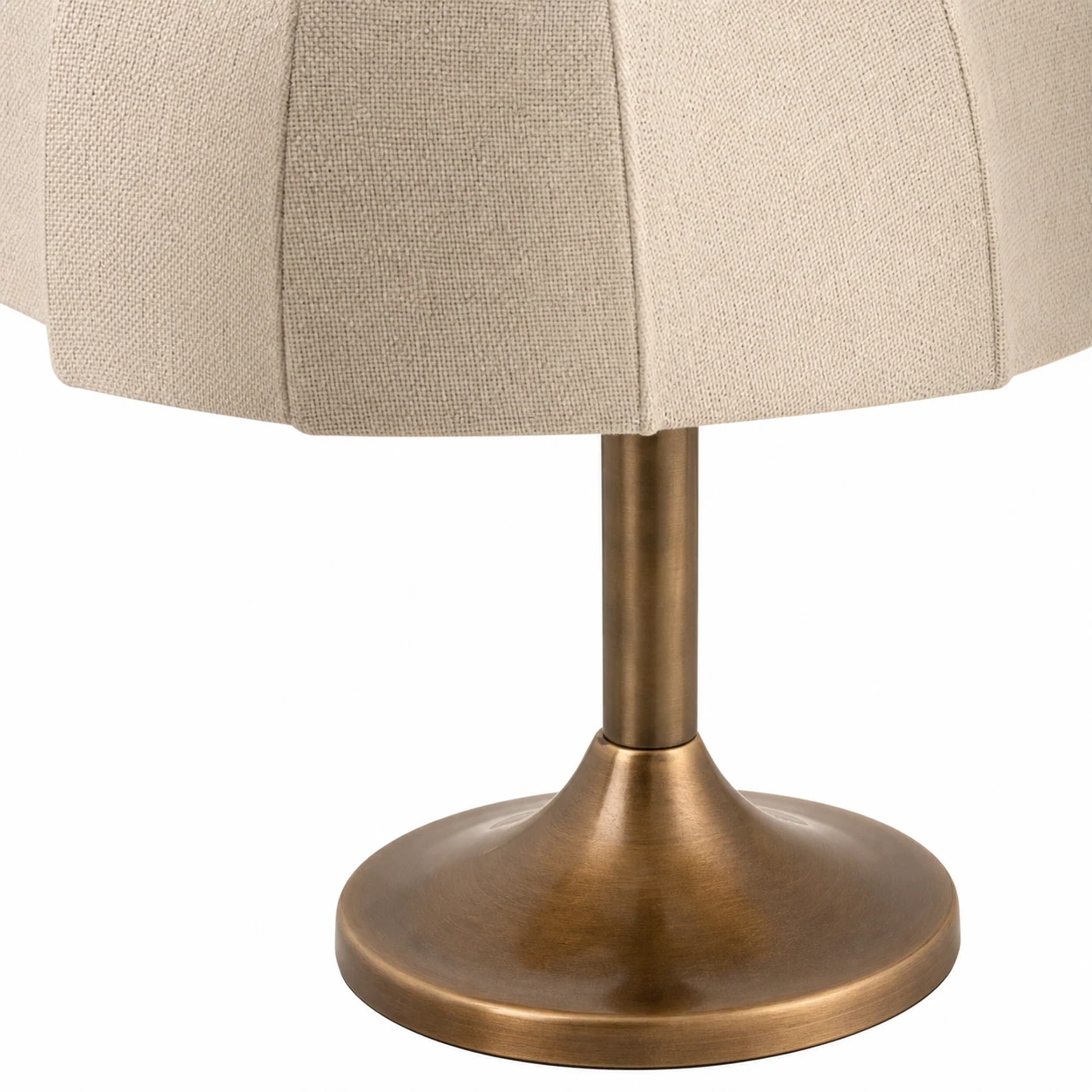 Close-up of Calmo linen shade texture and aged brass finish
