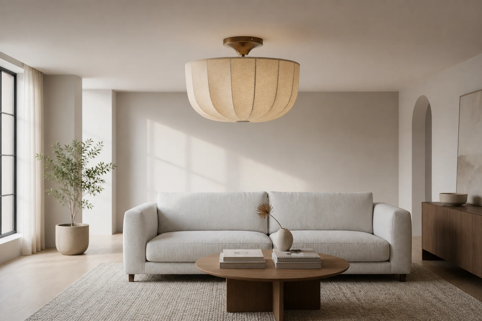 Lifestyle room scene with the Loomis linen and aged brass ceiling light